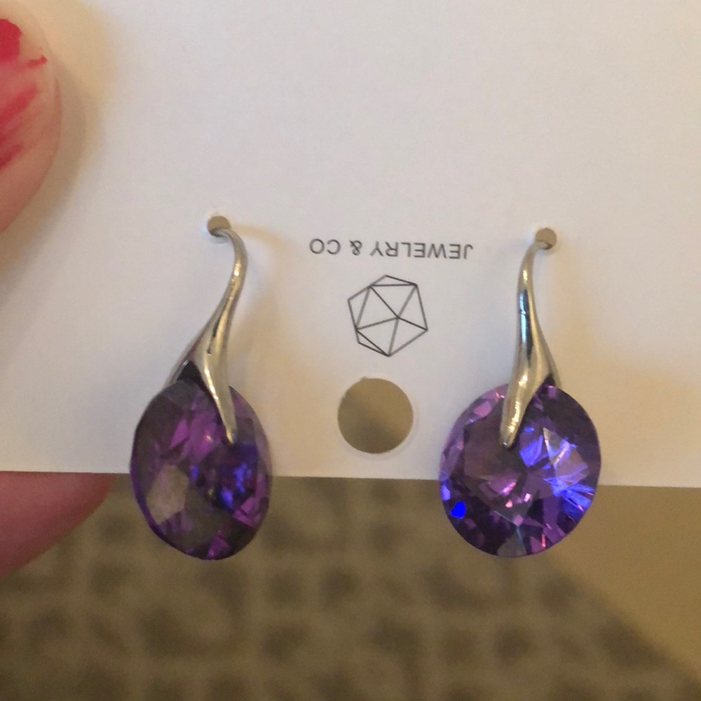 Silver earrings with purple crystal